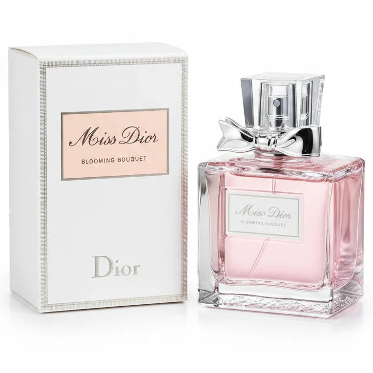 Miss Dior perfume bottle and packaging on a wooden surface